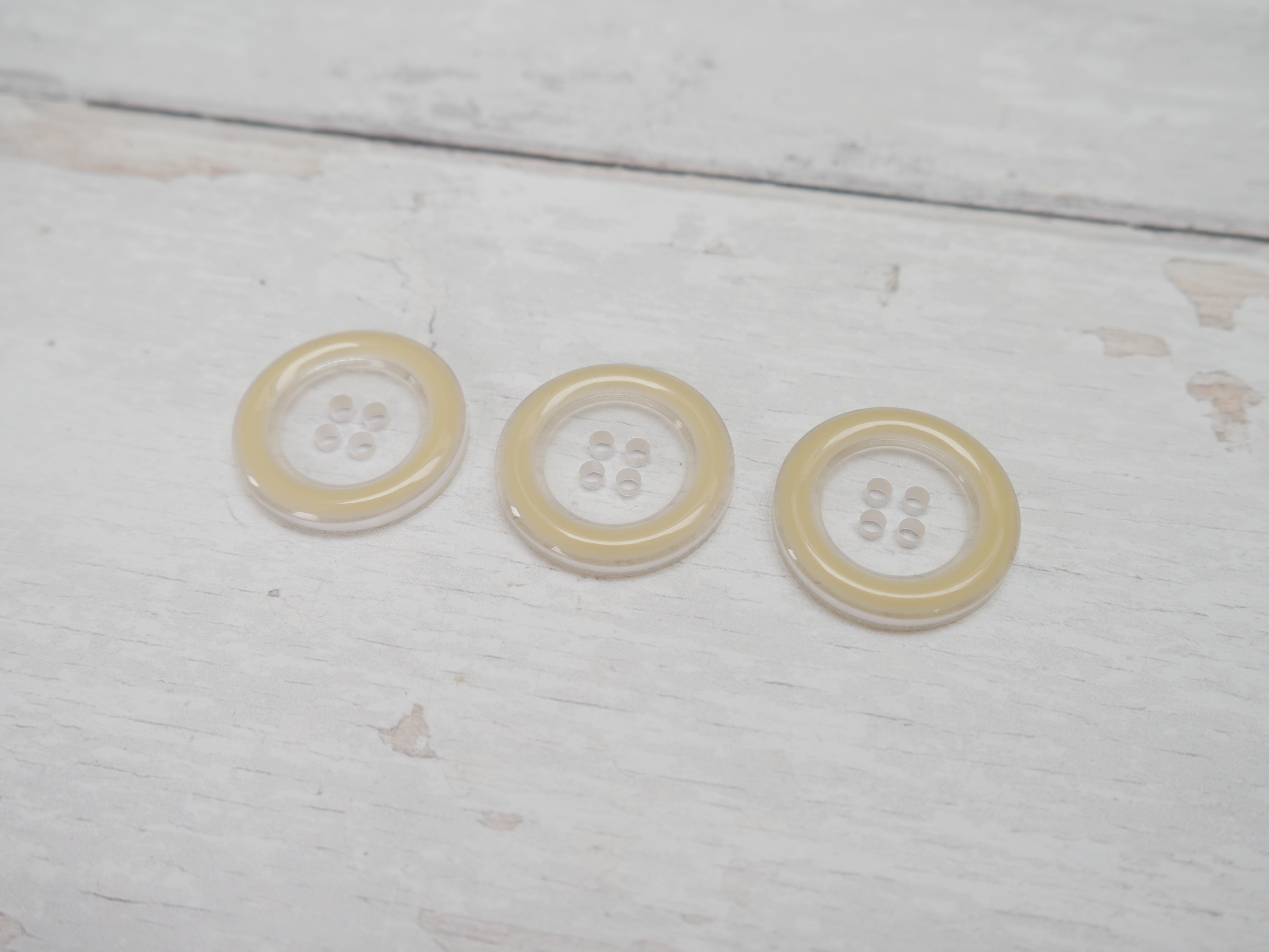 Clear, 25mm Coloured Rim 4-Hole Button in Cream-Button-Flying Bobbins Haberdashery