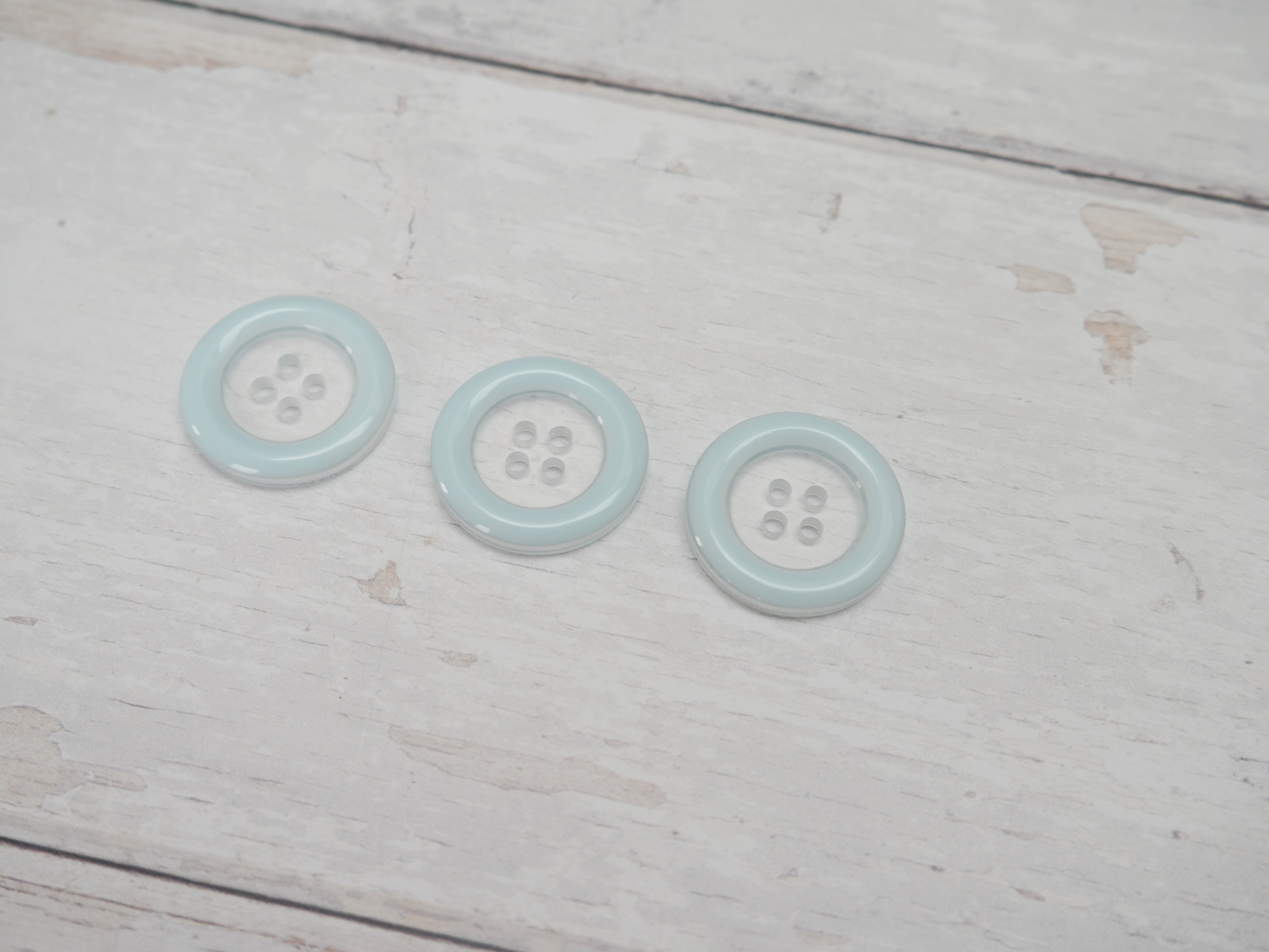 Clear, 25mm Coloured Rim 4-Hole Button in Blue-Button-Flying Bobbins Haberdashery