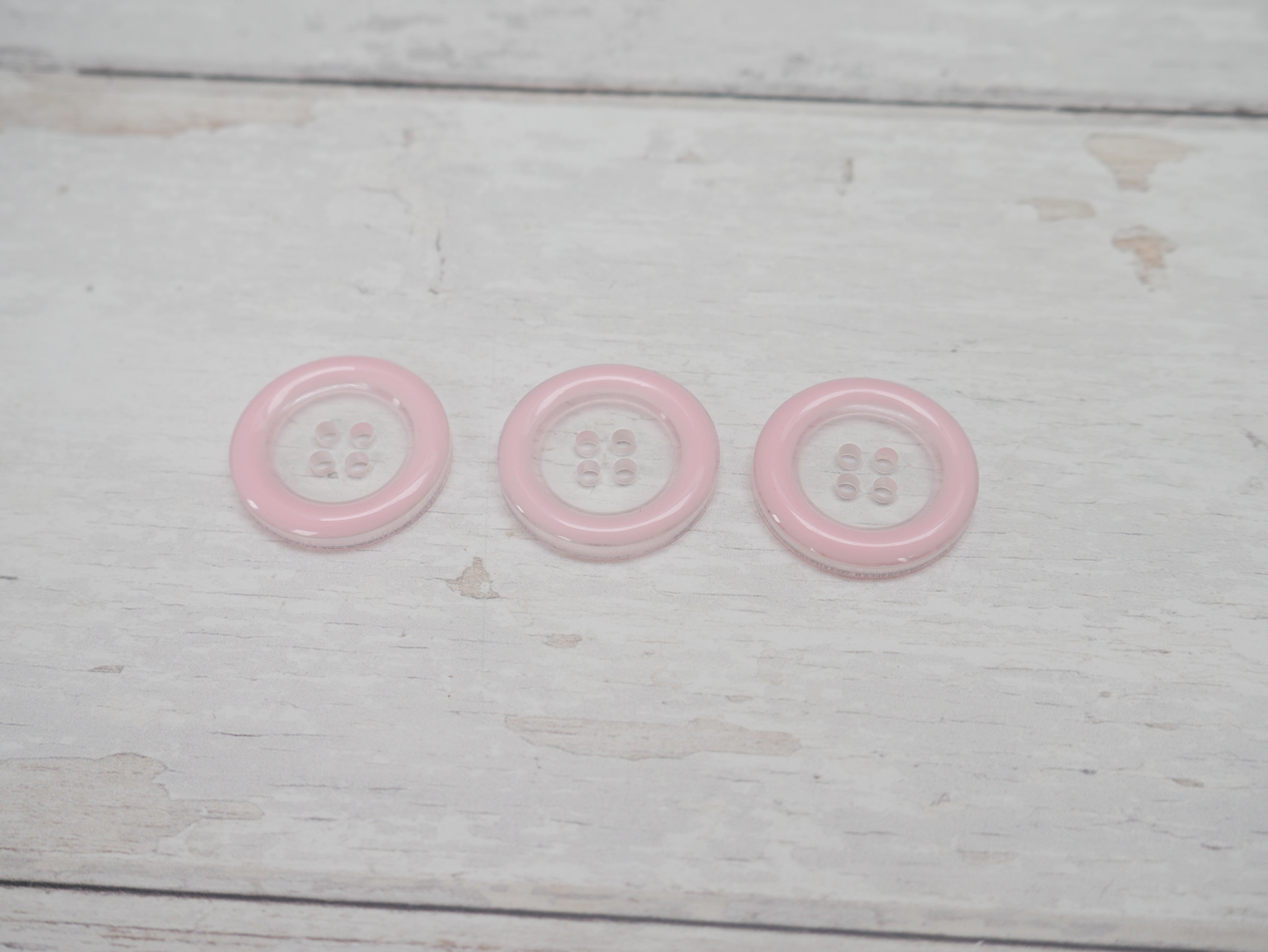 Clear, 25mm Coloured Rim 4-Hole Button in Pink-Button-Flying Bobbins Haberdashery