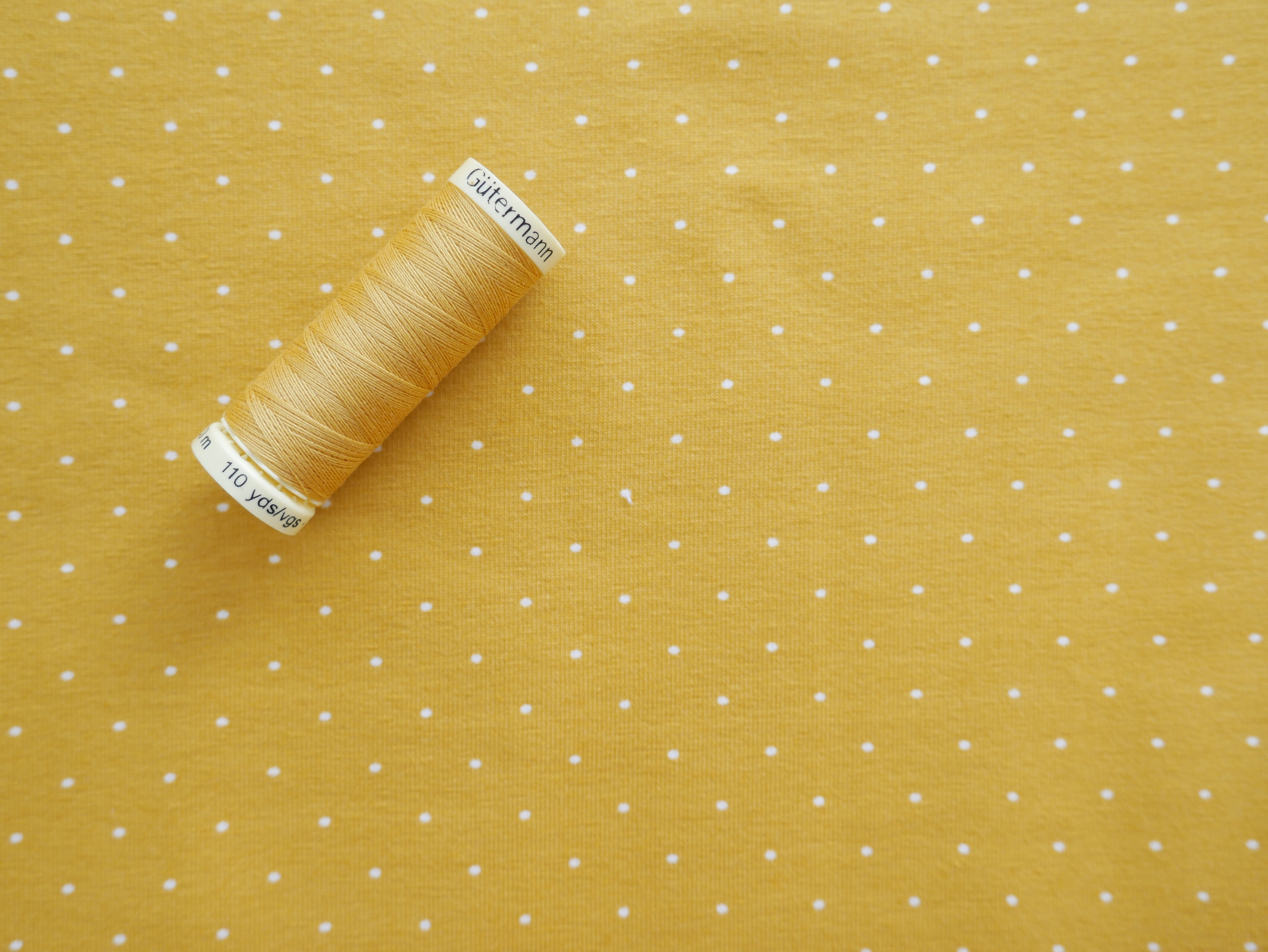 Pin Spot Cotton Jersey in Ochre £16.00 pm-Cotton Jersey-Flying Bobbins Haberdashery