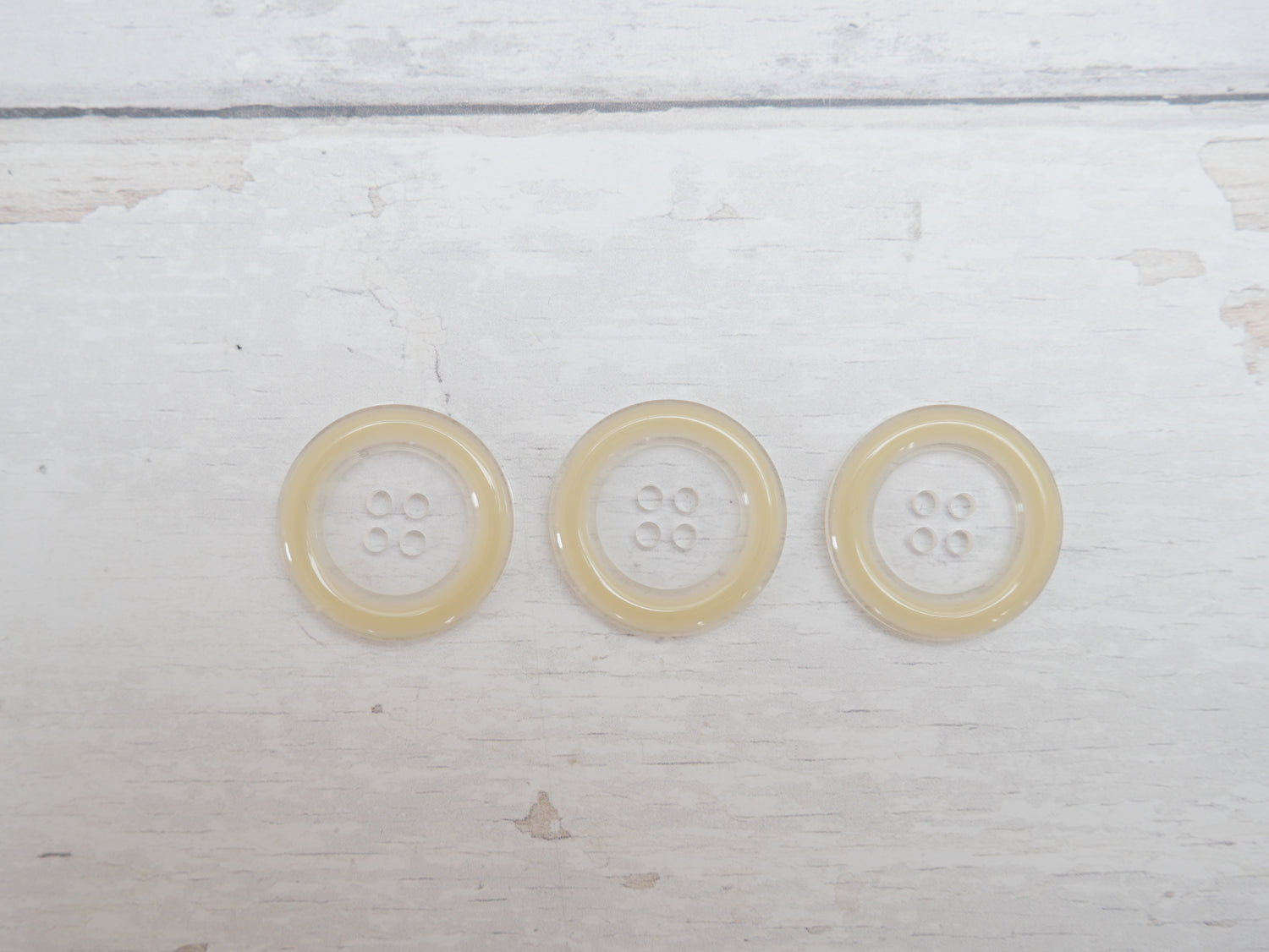 Clear, 25mm Coloured Rim 4-Hole Button in Cream-Button-Flying Bobbins Haberdashery