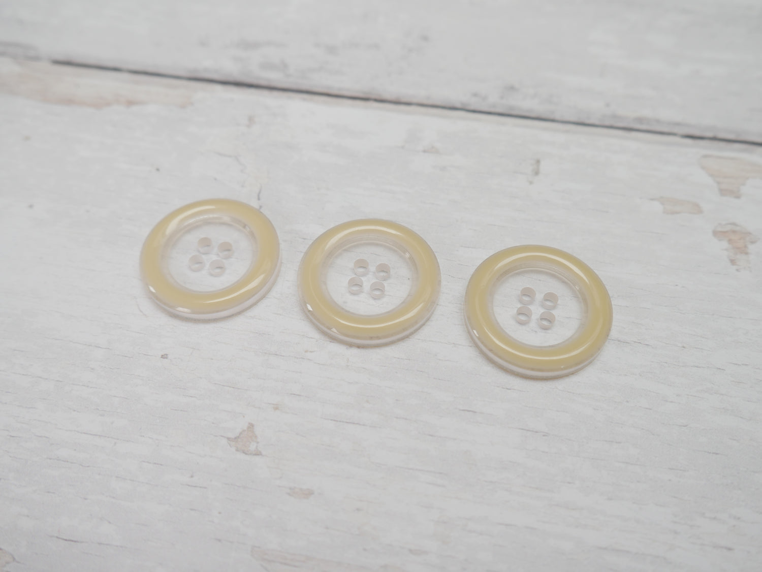 Clear, 25mm Coloured Rim 4-Hole Button in Cream-Button-Flying Bobbins Haberdashery