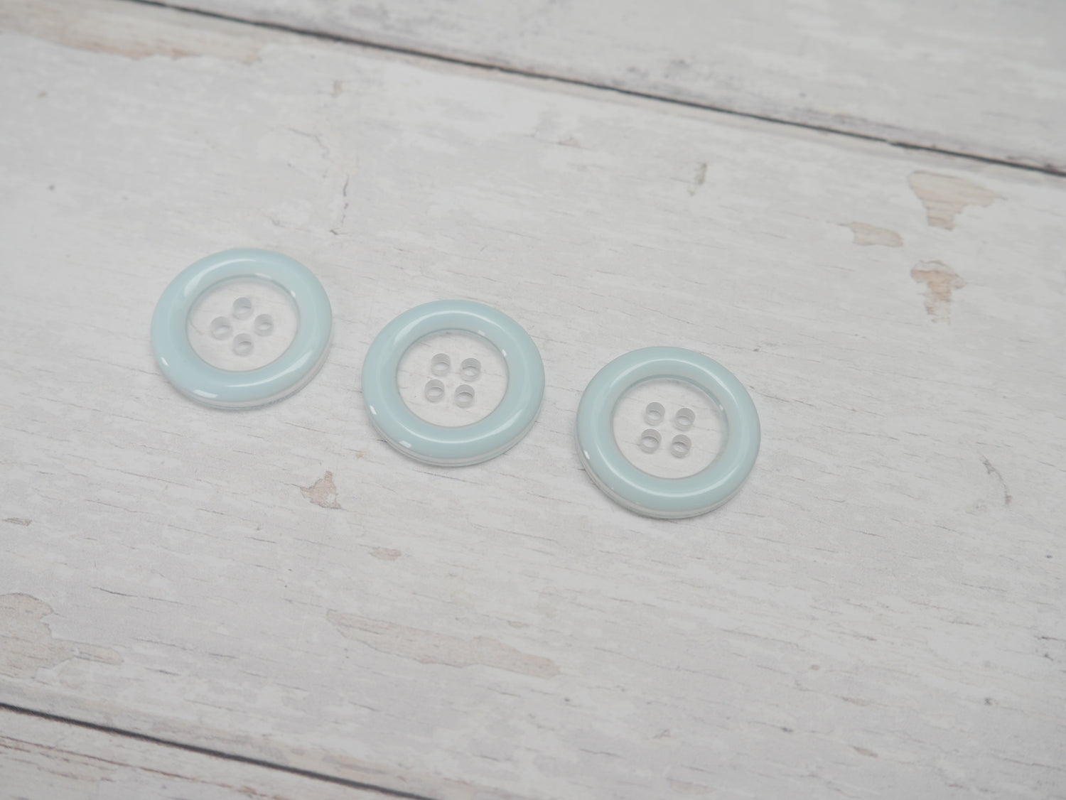 Clear, 25mm Coloured Rim 4-Hole Button in Blue-Button-Flying Bobbins Haberdashery